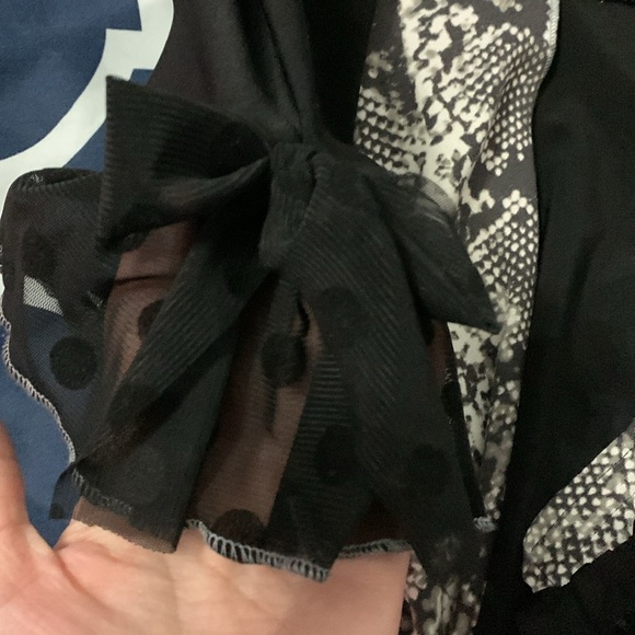 Ruffles and Mudpies brand top. Black and snake print. Size Medium - Picture 3 of 4